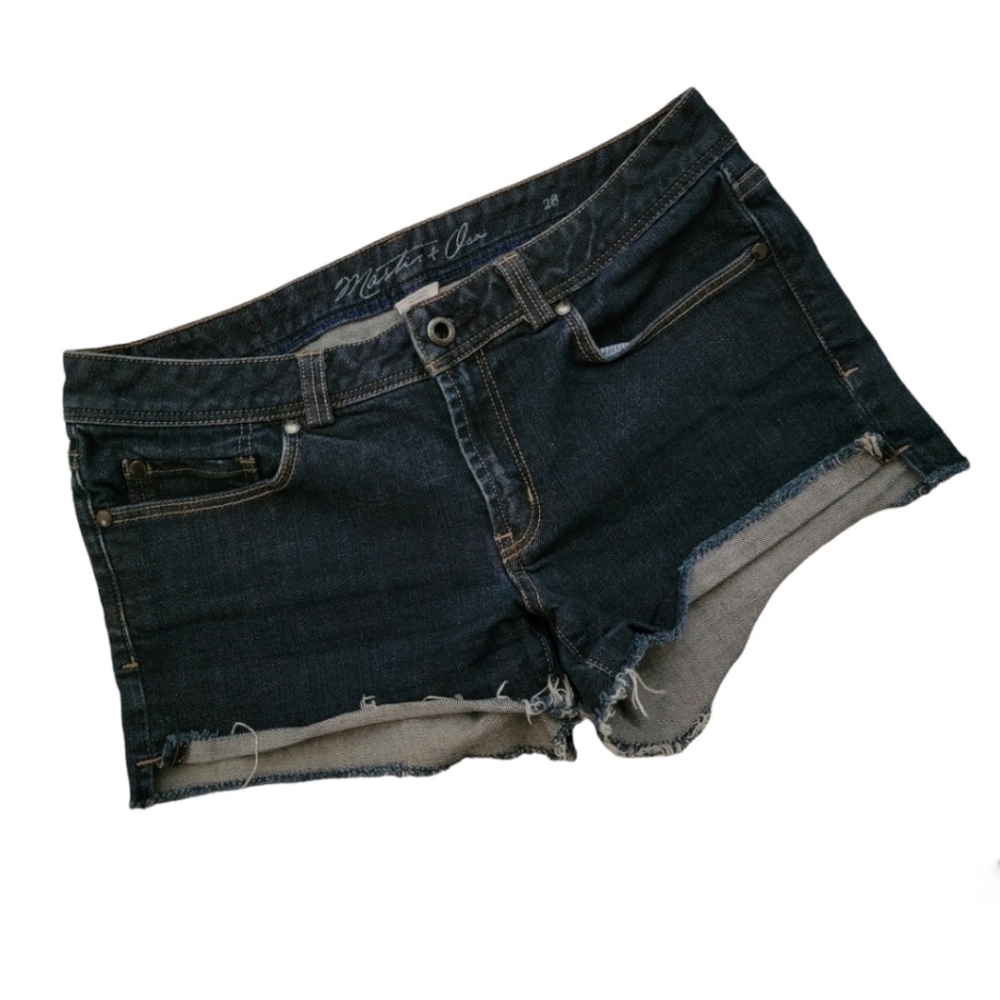 Martin + Osa | Dark wash denim cut off jean shorts with raw hem